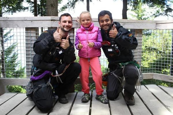 Ziptrek Ecotours guides (L) Kyle Thompson-Connell and (R) Arjun Thakkar with Cara Quinn (middle).